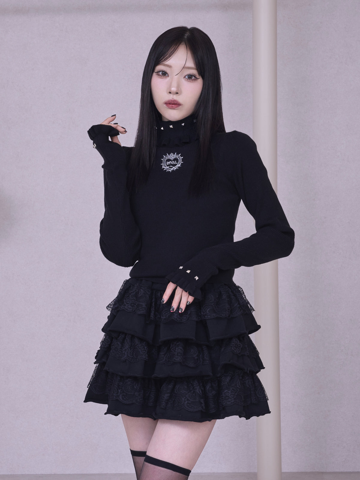 IMVAL / Ruffled High Neck Top [BLK]